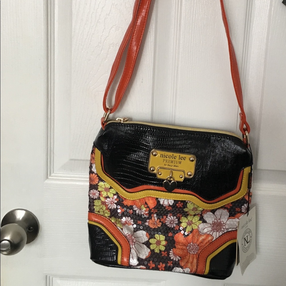 🌸🌼🌻🌺Nicole Lee Crossbody purse 🌸🌼🌺
